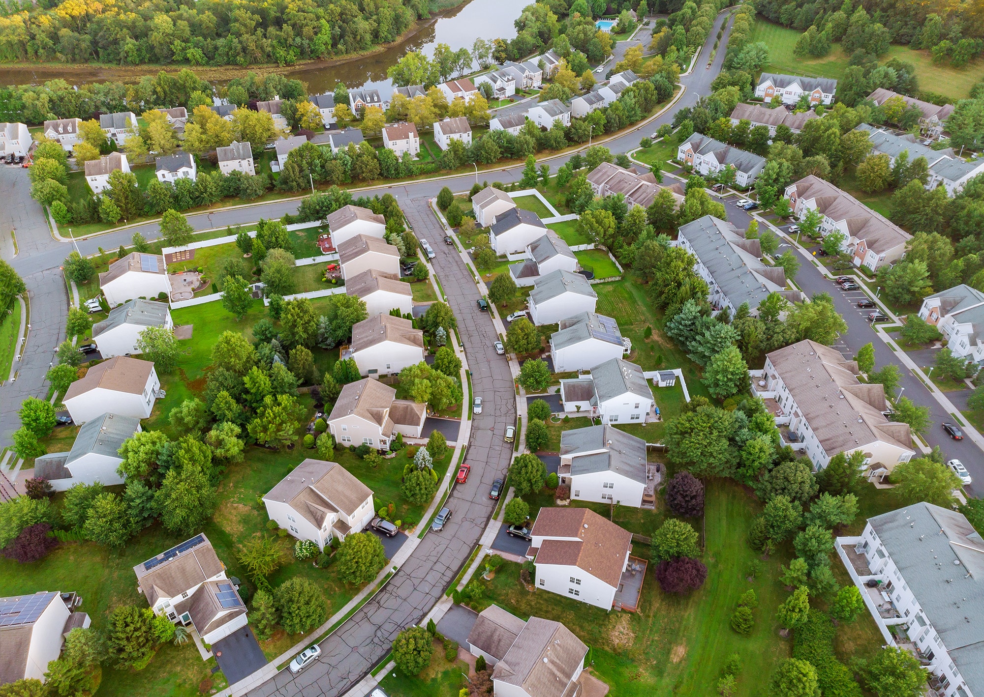 aerial view suburban homes roads early sunrise The Storm is Here - 22 Trends That May Have Major Impacts On Your Work & Life AI + Machine Learning, Business, Digital Culture, Digital Workspace, Finance, Insights, Management, Marketing, MR Mixed Reality, Personal Finance, Platforms, Process Optimization, VR Virtual Reality