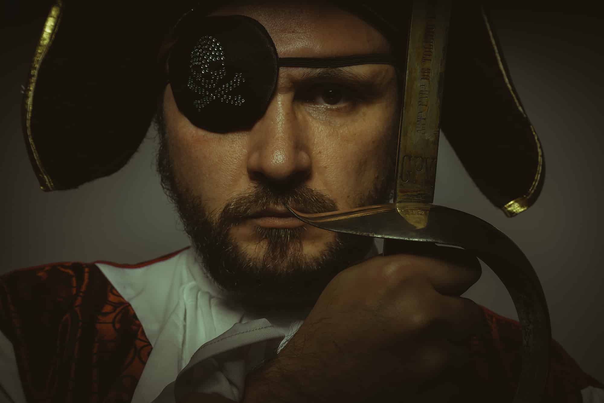 danger man with beard dressed like pirate with eye patch steel sword The Storm is Here - 22 Trends That May Have Major Impacts On Your Work & Life AI + Machine Learning, Business, Digital Culture, Digital Workspace, Finance, Insights, Management, Marketing, MR Mixed Reality, Personal Finance, Platforms, Process Optimization, VR Virtual Reality